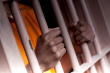 stock-photo-11434573-prison-hands-2.jpg